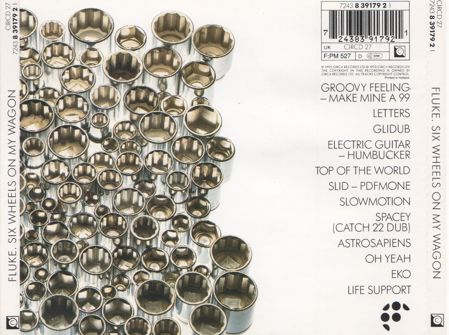 Back cover of Six Wheels on My Wagon by Fluke